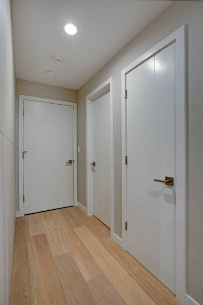 istock Hallway features ivory cabinets and taupe walls 924817778