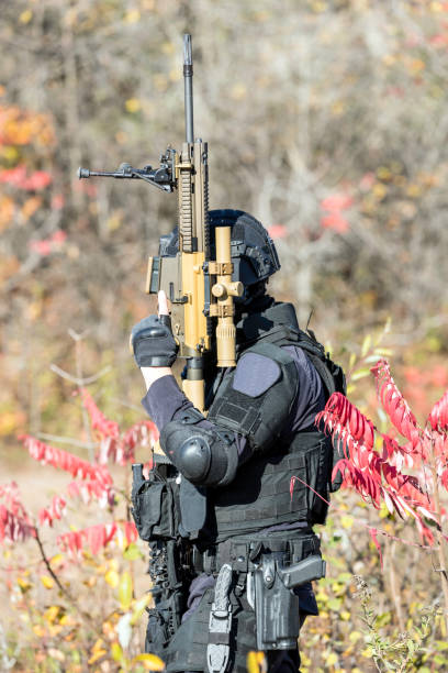 istock Swat Police Officer Shooting With Firearm 924821218