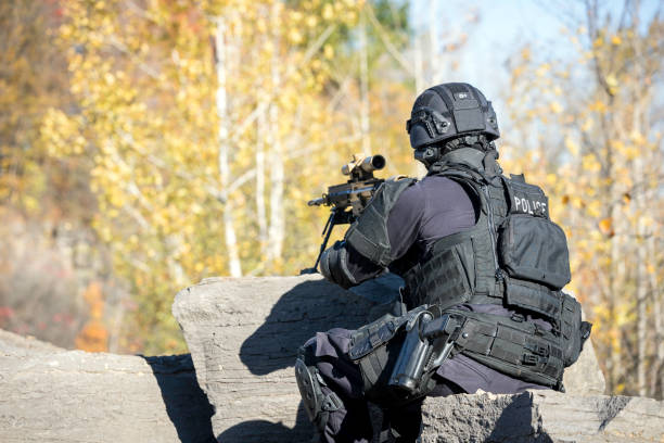 istock Swat Police Officer Shooting With Firearm 924821222