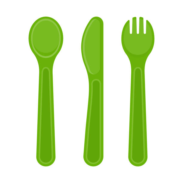Plastic cutlery isolated on white Vector illustration of plastic spoon, fork and knife isolated on white background. Disposable utensils in bright colors for toddler feeding, party or picnic. baby spoon stock illustrations
