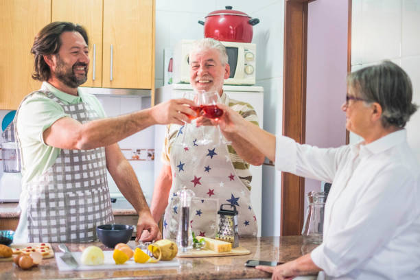 istock 3 people toast at home with wine 924832626