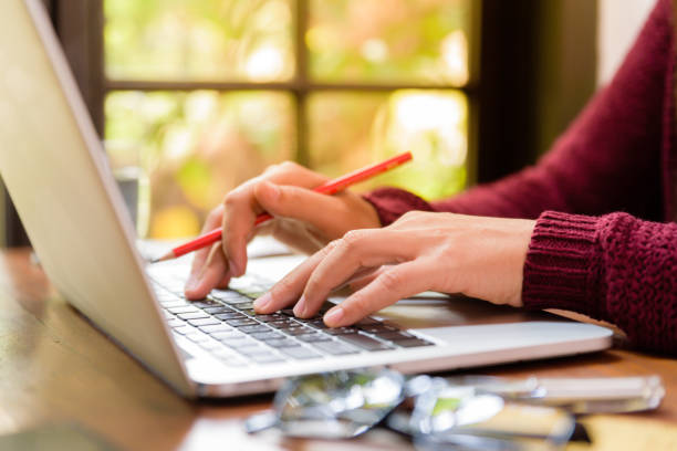 istock Soft focus Closeup woman hand working on her laptop. Social networking technology concept. 924833862