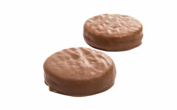 istock chocolate biscuit sandwich in chocolate glaze isolated 924845576