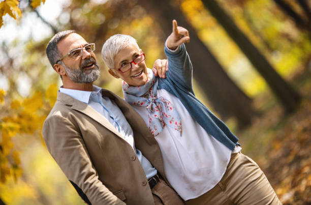 istock Mid aged couple in a park 924846158