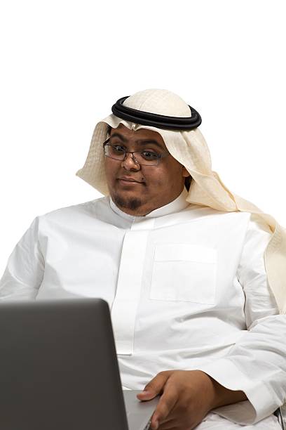 Arabian empresário com um laptop - foto de acervo