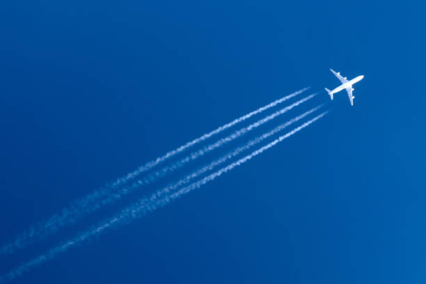 istock Airplane big four engines aviation airport contrail clouds. 924850078