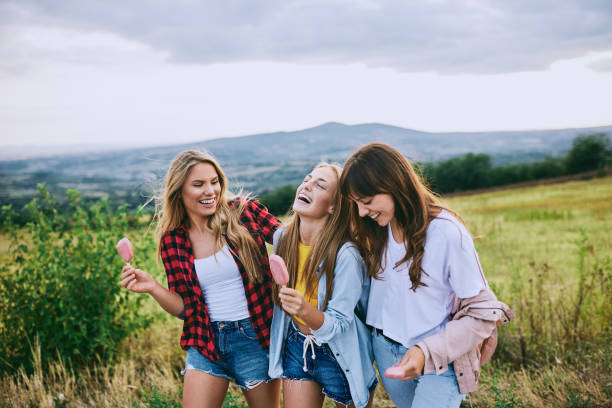 istock Three girlfriends taking a walk in the nature. 924853484