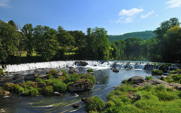 istock low waterfall along a river in the woods 92485566