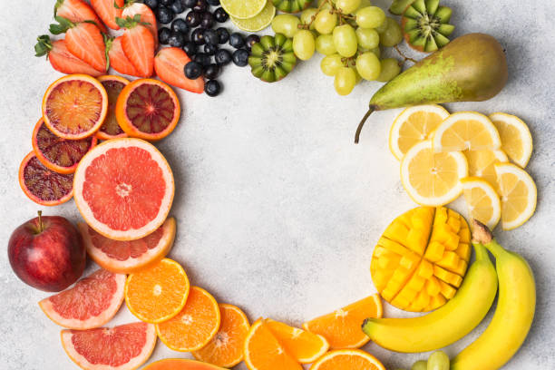 istock Top view of rainbow fruits and berries 924861348