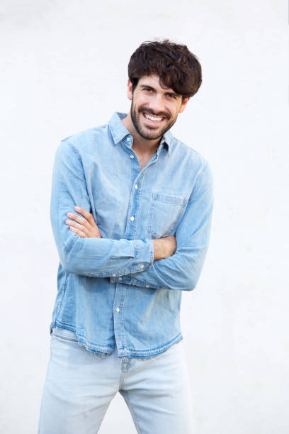istock happy smiling man posing against white background 924861542