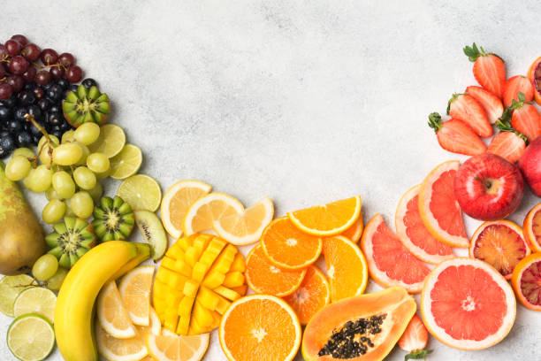 istock Top view of rainbow fruits and berries 924861676