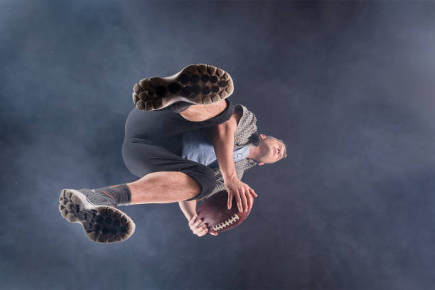 istock man playing rugby in fog 924866562