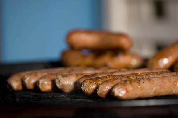 istock Thin and thick sausages on a barbecue / bbq 92487618