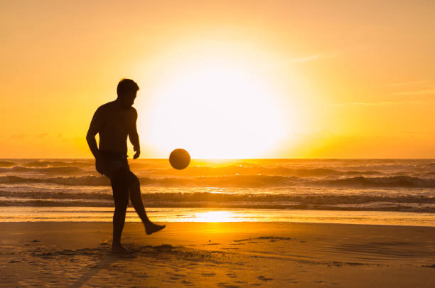 great concept of soccer, freestyle soccer. - beach football imagens e fotografias de stock