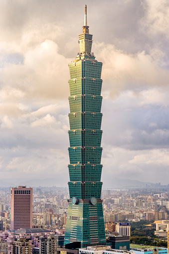 TAIPEI, TAIWAN - JANUARY 16, 2013: Taipei 101 stands over the Taipei skyline.
