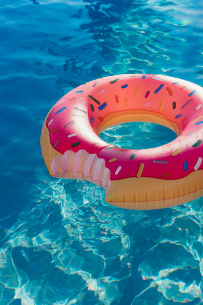 istock Donut inflatable on swimming pool 924894110