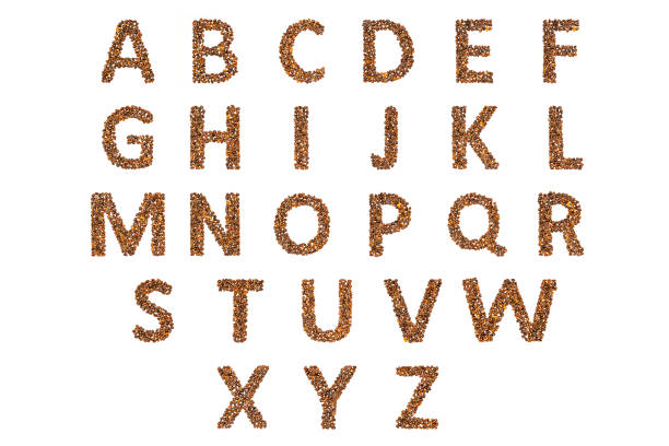 istock Alphabet made of nuts isolated on white 924894418