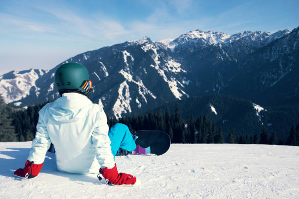 istock snowboarder on ski slope in winter mountains 924897944