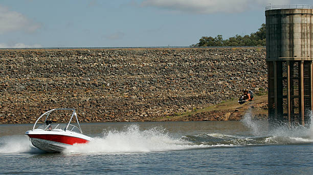 A wakeboarder gets massive air off a double up boat maneuver in New South Wales Australia, please check out my portfolio to see my other extreme sport still images and video clips.