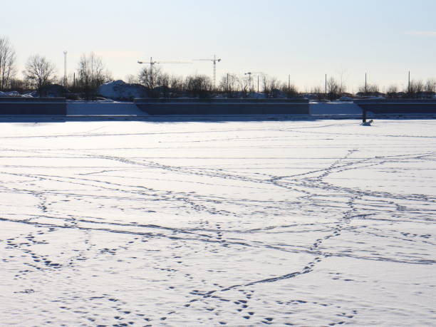 istock tracks on snowy ice on a winter day 924898306