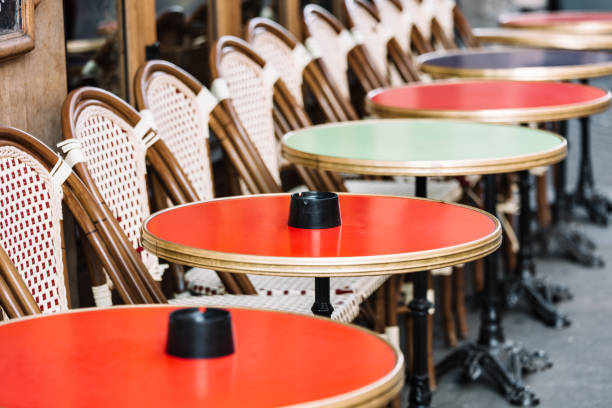 istock Empty chairs in a restaurant on the streets of Paris 924899282