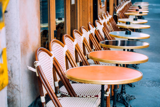 istock Empty chairs in a restaurant on the streets of Paris 924899578