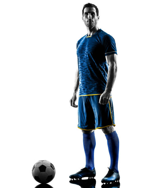 istock soccer player man standing silhouette isolated 924907992