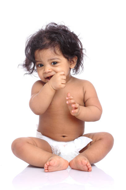 istock Cute Indian baby girl on white 924911564