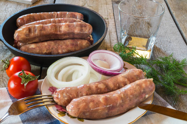 istock Raw meat sausages before frying 924911688