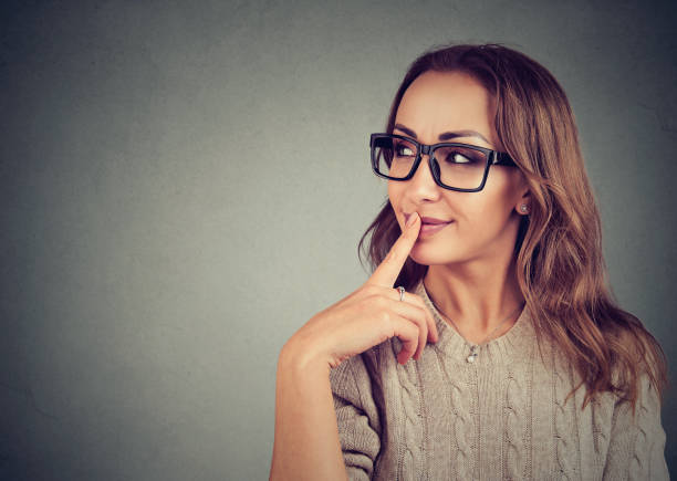 istock Flirting young girl in eyeglasses 924918498