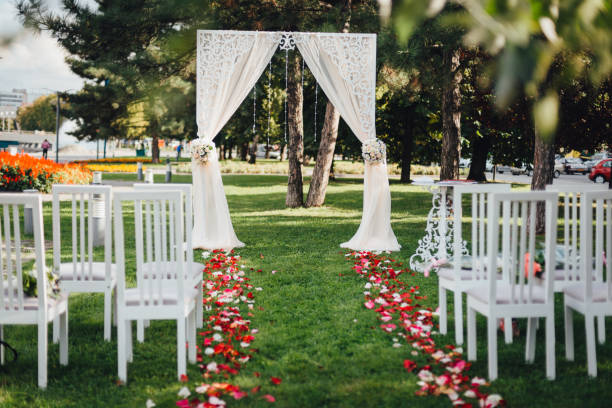 istock Wedding ceremony, arch decorated with cloth and flowers 924919734