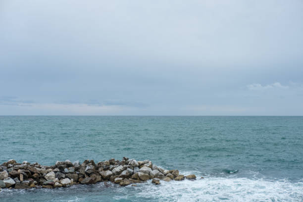 istock Sea waves crashing on the rock. 924922450