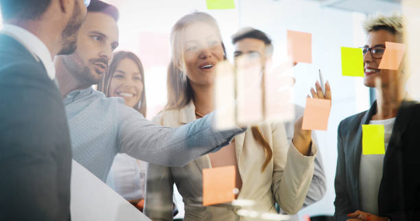istock Picture of designers sticking notes in office 924923034