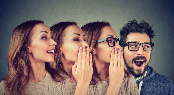 istock Women and man sharing with gossip 924924022