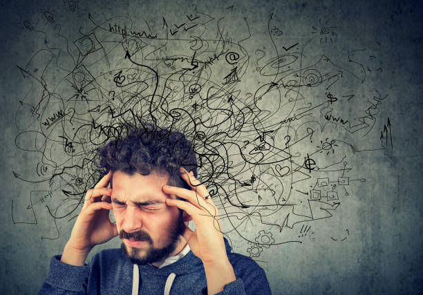 istock Thoughtful stressed young man with a mess in his head 924925656