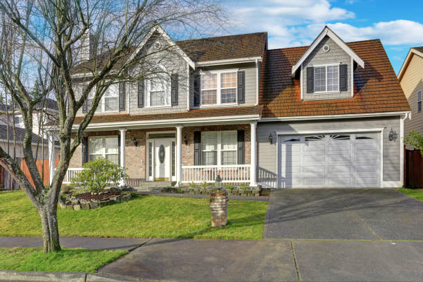 istock Gray mixed siding home with nice landscaping 924930958