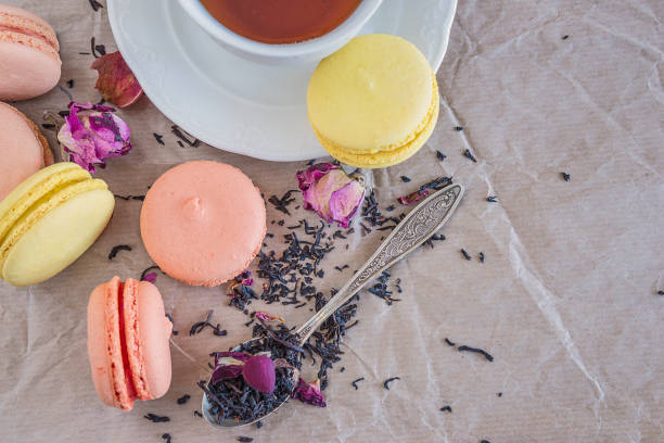 istock French macaroons, dry tea with rose flowers 924932126