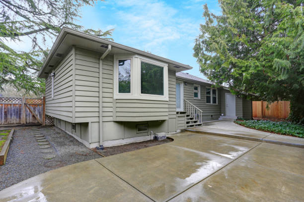 istock Backyard view of a small home on a rainy day 924938158