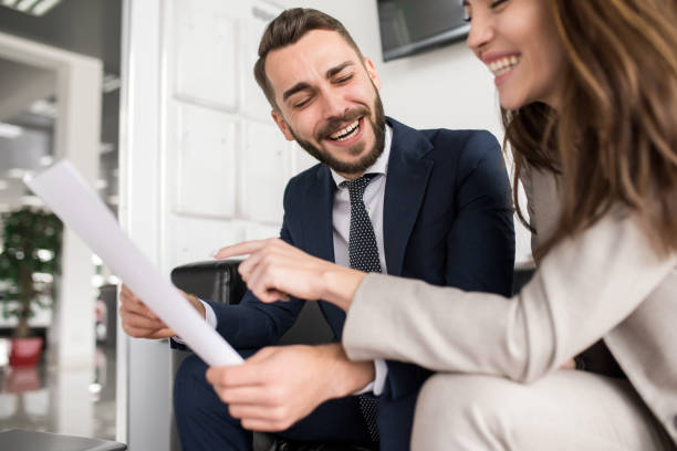 istock Handsome Businessman Laughing in Meeting 924938284