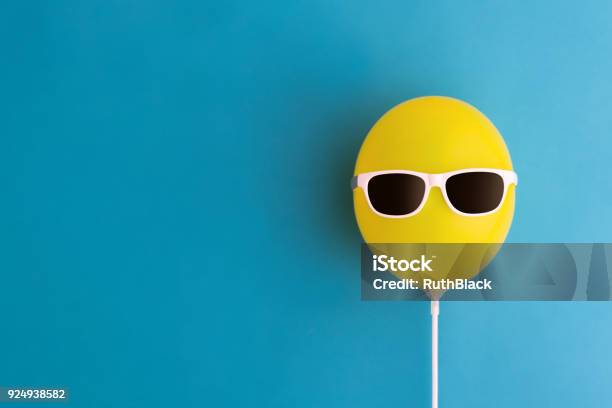 Yellow Balloon With Sunglasses Stock Photo - Download Image Now - Offbeat, Balloon, Eyeglasses