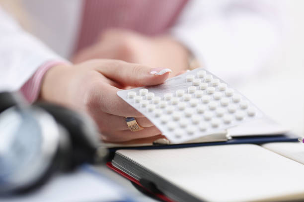 istock Female doctor hand holding pack of different 924939292