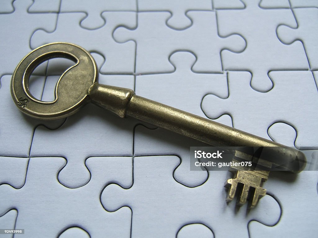 Quebra-cabeça e chave - Royalty-free Abrir Foto de stock