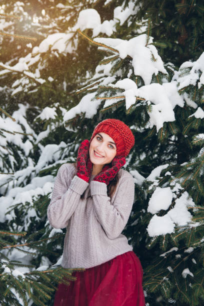 istock Woman having fun in winter forest 924951370