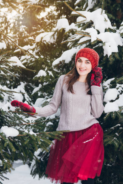 istock Woman having fun in winter forest 924953560