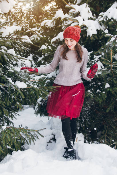 istock Woman having fun in winter forest 924953692