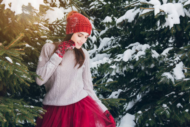 istock Woman having fun in winter forest 924954204