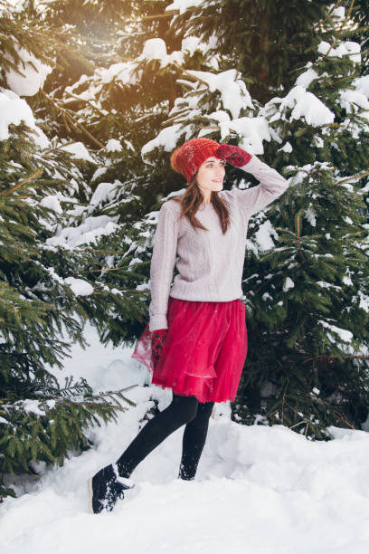istock Woman having fun in winter forest 924954510