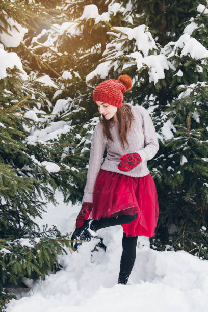 istock Woman having fun in winter forest 924954622