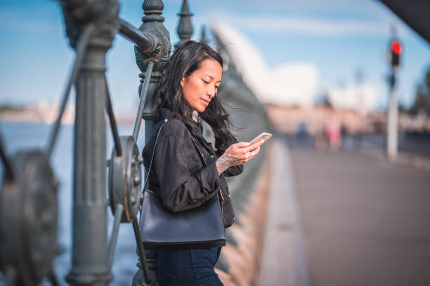 istock Woman using phone in Sydney 924955370