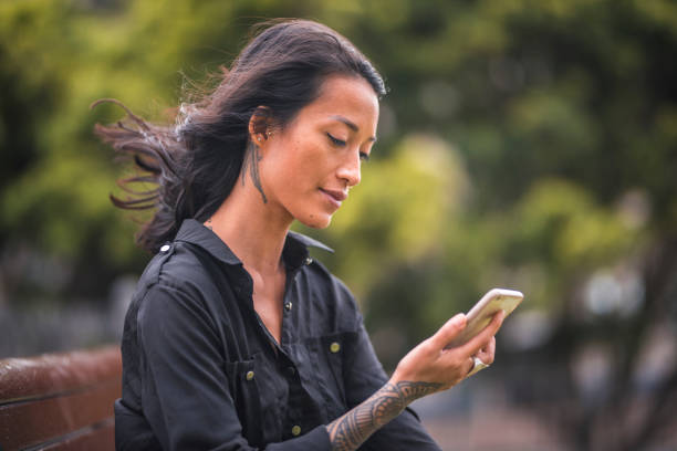 istock Asian woman using phone in Sydney 924955402
